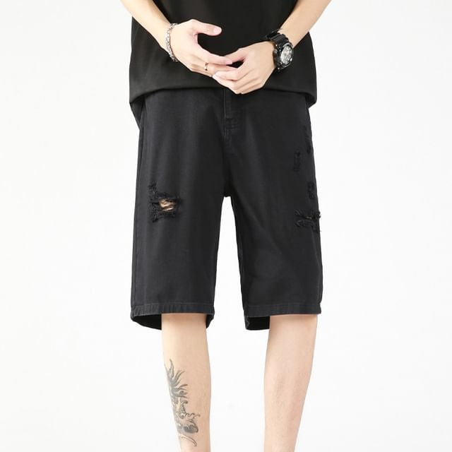 Mid Rise Distressed Denim Shorts