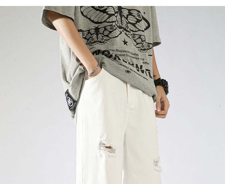 Mid Rise Distressed Denim Shorts