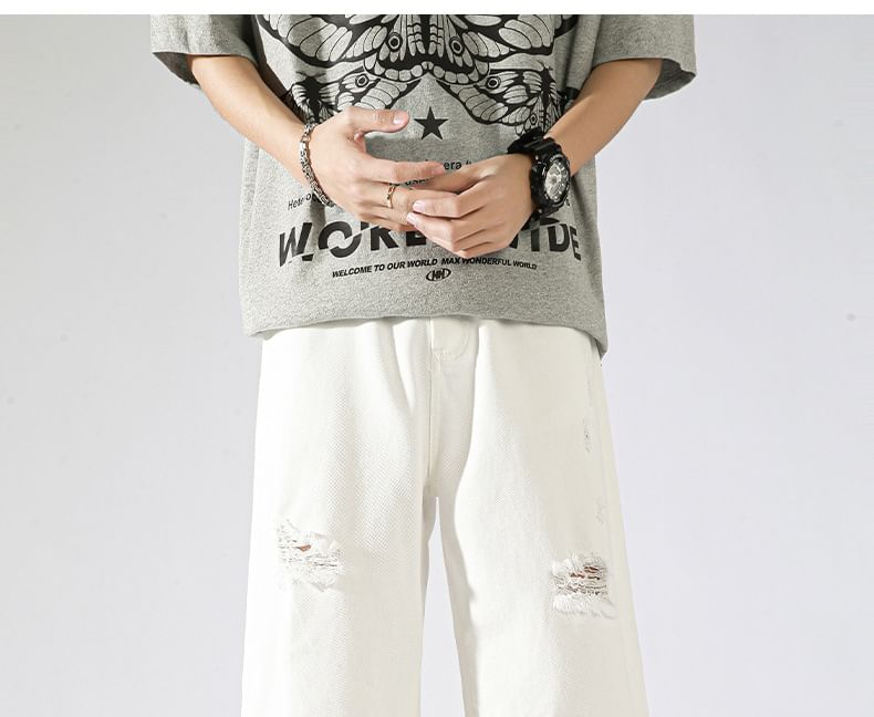 Mid Rise Distressed Denim Shorts